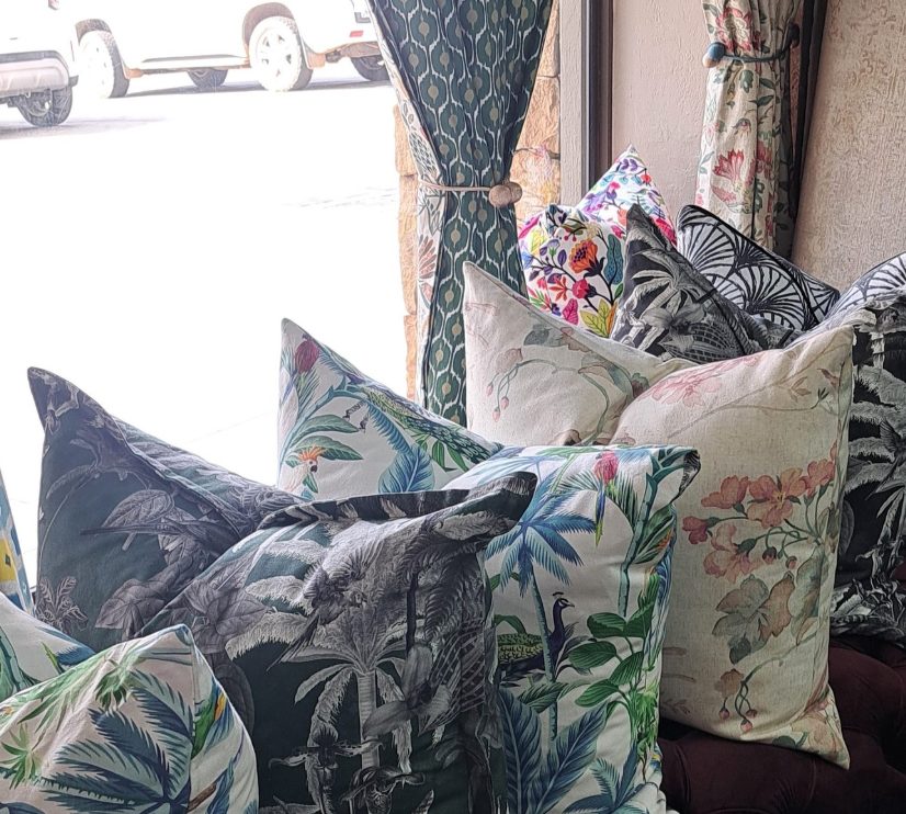 Cushions in a mix of botanical prints